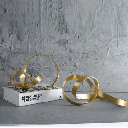 Criativo artesanato de ouro nó linha dourada oco estatueta de metal enrolamento corda estatuetas decorativas acessórios de decoração para casa